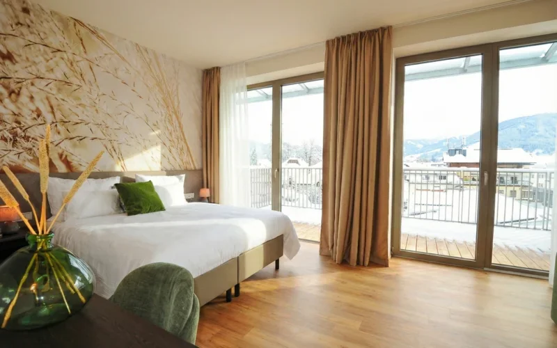 Executive Suite mit Balkon und Bergblick im Winter